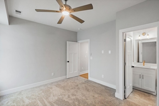 803 Arbor Trace Cir, Nashville, TN 37207 - unfurnished bedroom featuring baseboards, visible vents, light carpet, and a sink