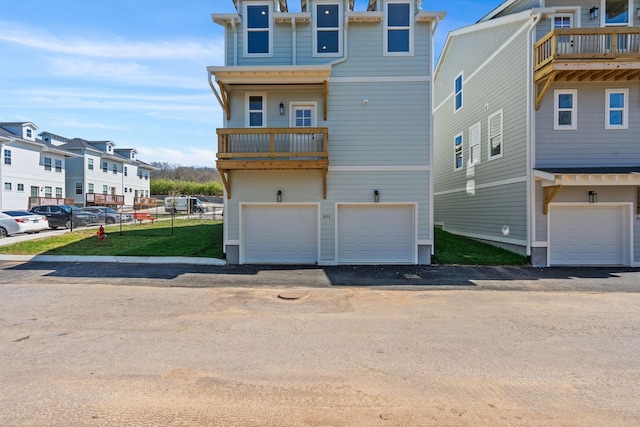 803 Arbor Trace Cir, Nashville, TN 37207 - coastal home featuring a residential view, an attached garage, and a balcony