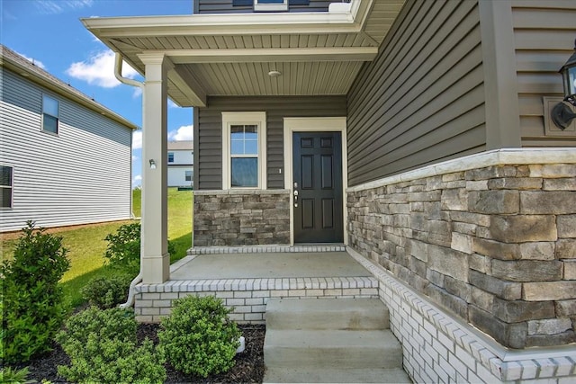 3294 Holiday Ln, Columbia, TN 38401 - view of exterior entry with a porch and stone siding