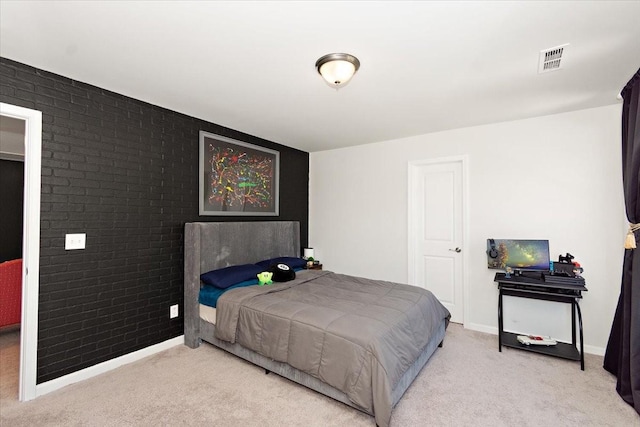 3294 Holiday Ln, Columbia, TN 38401 - bedroom with carpet floors, brick wall, visible vents, and baseboards