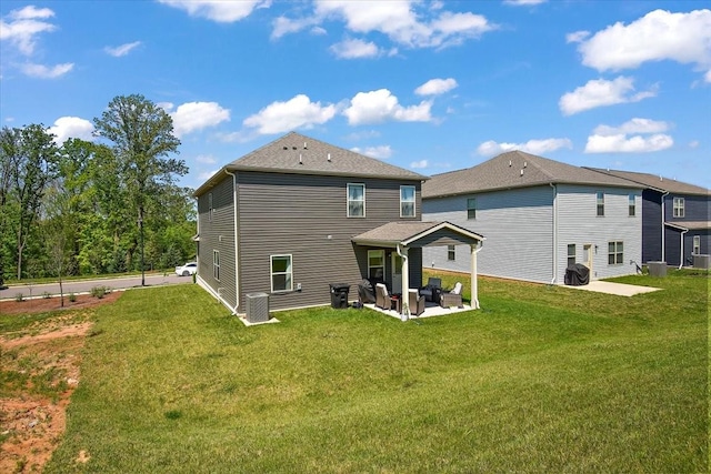 3294 Holiday Ln, Columbia, TN 38401 - back of house featuring a lawn and a patio area