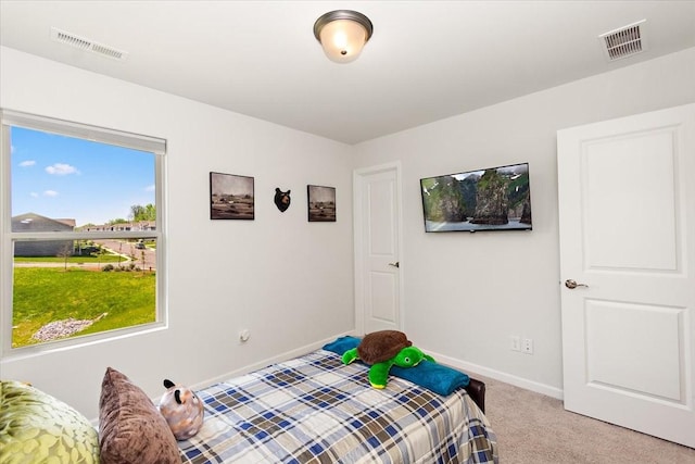 3294 Holiday Ln, Columbia, TN 38401 - bedroom featuring visible vents, baseboards, and light carpet