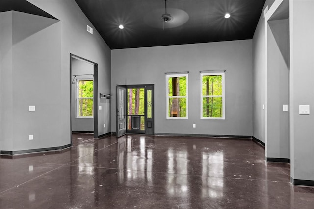 8360 Pinewood Rd, Lyles, TN 37098 - spare room featuring baseboards, visible vents, recessed lighting, and a towering ceiling