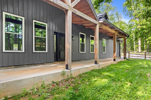 8360 Pinewood Rd, Lyles, TN 37098 - view of home's exterior with a lawn, fence, and a patio area