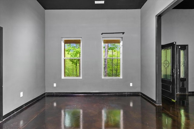 8360 Pinewood Rd, Lyles, TN 37098 - spare room featuring baseboards and finished concrete flooring