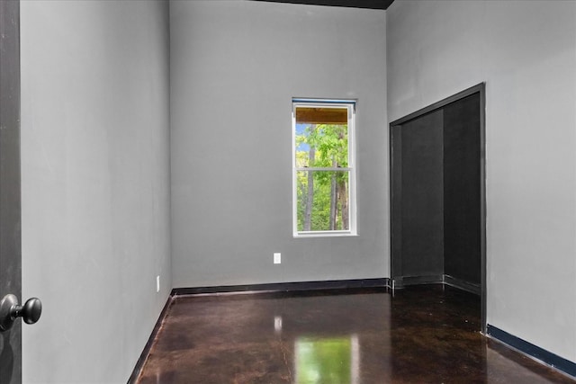 8360 Pinewood Rd, Lyles, TN 37098 - unfurnished room with finished concrete floors and baseboards