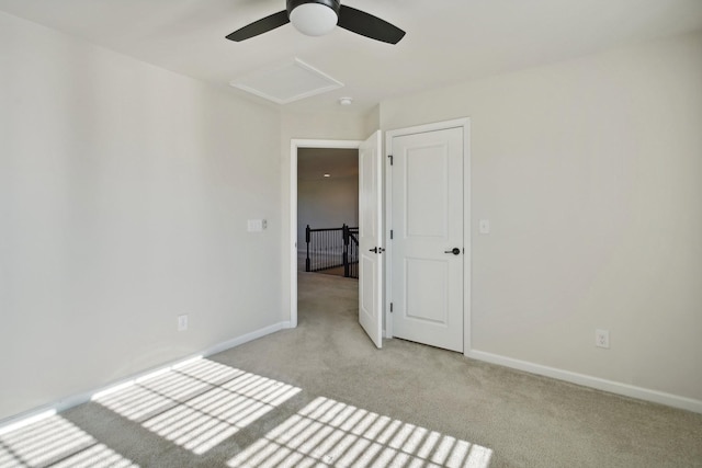 820 Turnbo Dr, Gallatin, TN 37066 - carpeted spare room with baseboards, a ceiling fan, and attic access