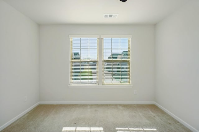 820 Turnbo Dr, Gallatin, TN 37066 - carpeted spare room featuring baseboards, visible vents, and a wealth of natural light