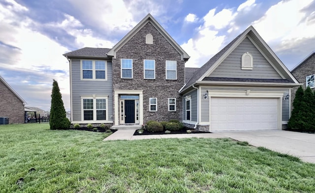 820 Turnbo Dr, Gallatin, TN 37066 - colonial house featuring central AC, driveway, stone siding, and a front lawn