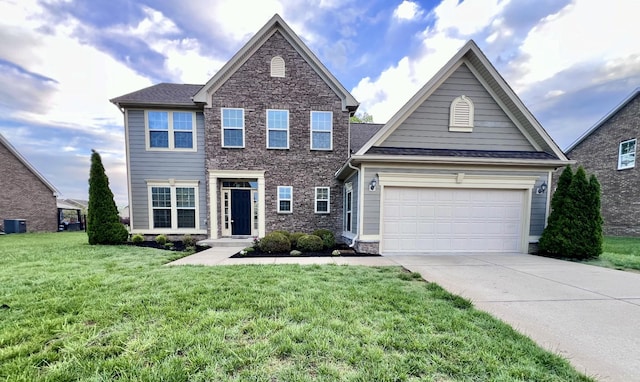 820 Turnbo Dr, Gallatin, TN 37066 - view of front facade featuring an attached garage, a front lawn, stone siding, central AC unit, and concrete driveway