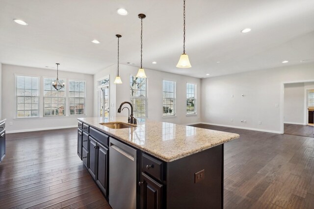820 Turnbo Dr, Gallatin, TN 37066 - kitchen featuring stainless steel dishwasher, a sink, baseboards, light stone counters, and dark wood-type flooring