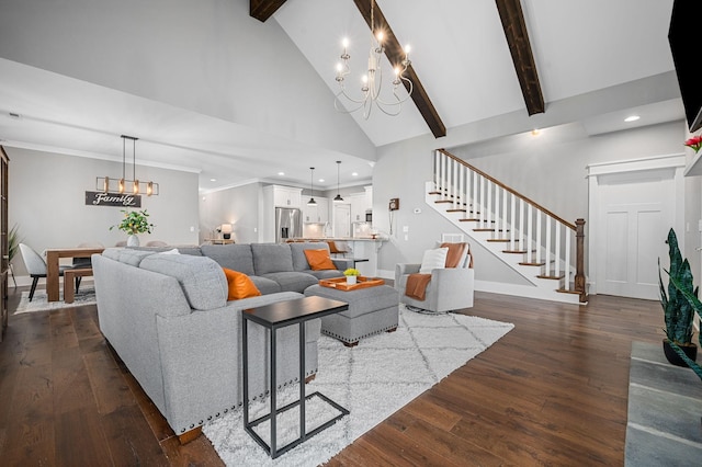 living room featuring dark wood-type flooring, stairs, a chandelier, and high vaulted ceiling