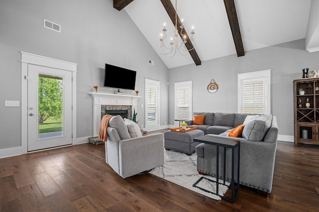 living room with high vaulted ceiling, visible vents, an inviting chandelier, and dark wood finished floors