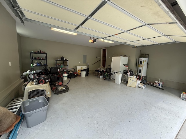 6591 Clear Creek Rd, Pulaski, TN 38478 - garage with water heater, freestanding refrigerator, electric panel, and a garage door opener