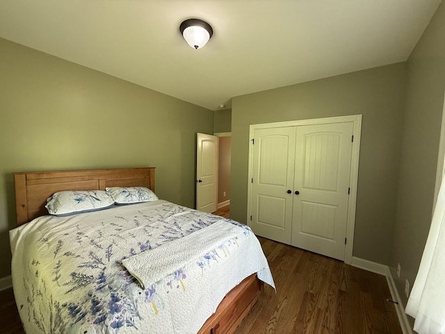 6591 Clear Creek Rd, Pulaski, TN 38478 - bedroom with wood finished floors, a closet, and baseboards