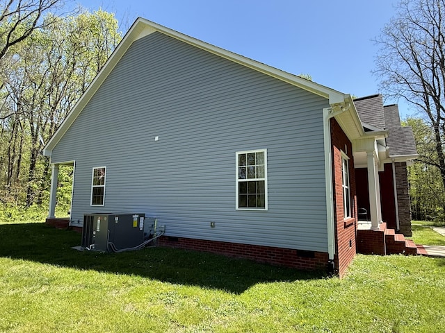 6591 Clear Creek Rd, Pulaski, TN 38478 - view of side of property featuring a lawn, central AC, and crawl space