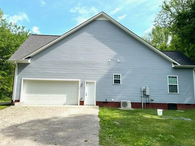 6591 Clear Creek Rd, Pulaski, TN 38478 - view of side of home featuring ac unit, driveway, an attached garage, and a lawn