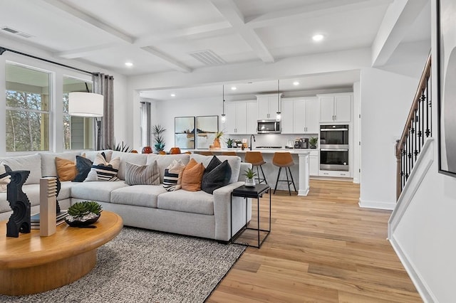 1611 Burlwood Ct, Murfreesboro, TN 37129 - living area featuring stairs, beamed ceiling, coffered ceiling, recessed lighting, and light wood-style flooring