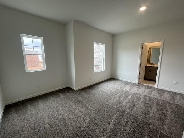 1611 Burlwood Ct, Murfreesboro, TN 37129 - unfurnished room featuring carpet floors, baseboards, and a sink