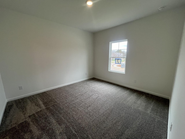 1611 Burlwood Ct, Murfreesboro, TN 37129 - empty room with dark colored carpet and baseboards