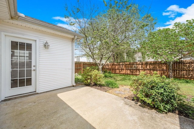 view of patio with fence