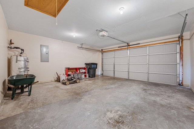 garage featuring a garage door opener and electric panel