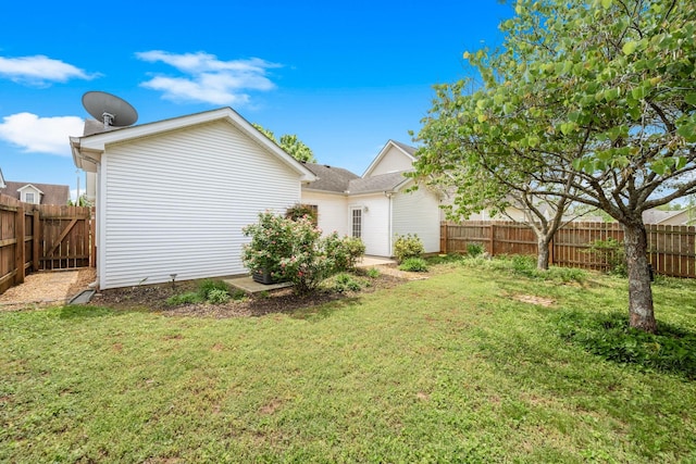 exterior space with a fenced backyard