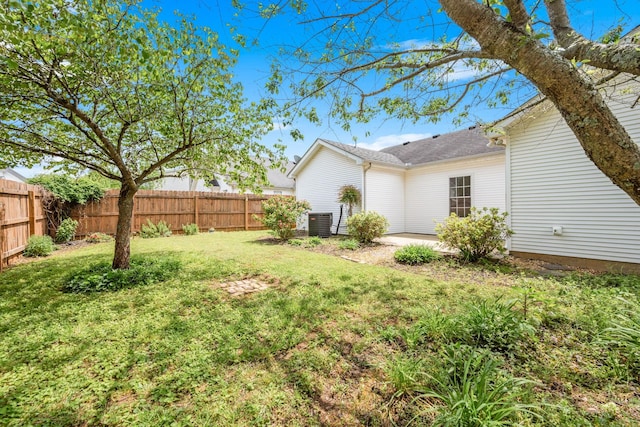 exterior space featuring a lawn, a fenced backyard, and a patio area