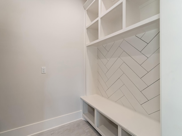 mudroom featuring baseboards