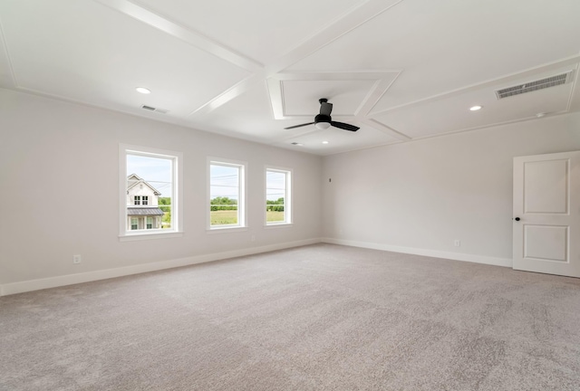 unfurnished room with visible vents, baseboards, and light colored carpet