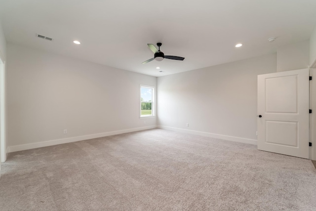 unfurnished room featuring visible vents, baseboards, ceiling fan, recessed lighting, and light colored carpet