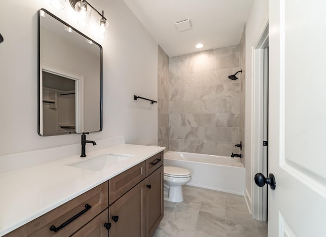 full bath featuring vanity, shower / bathtub combination, and toilet