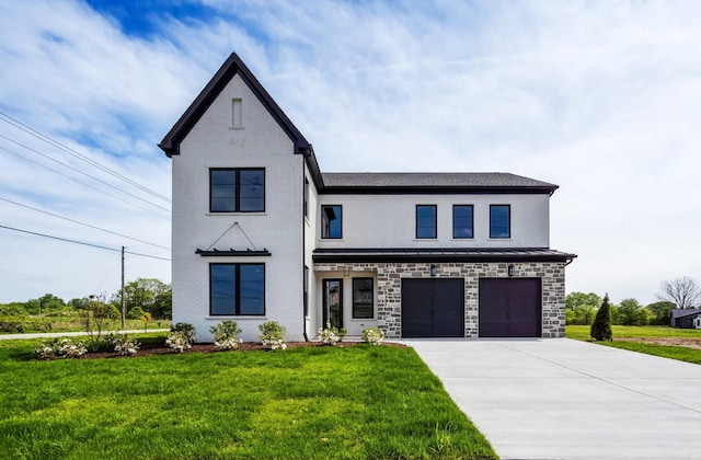 modern inspired farmhouse with concrete driveway, an attached garage, and a front lawn
