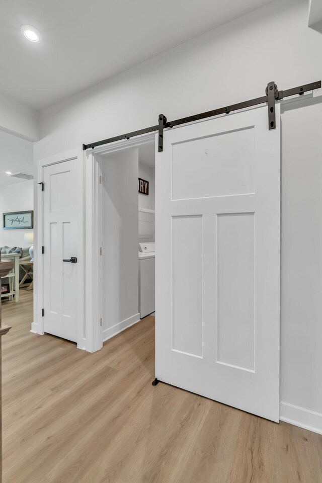 3012 Manchester Dr, Spring Hill, TN 37174 - interior space featuring recessed lighting, baseboards, light wood-type flooring, and a barn door