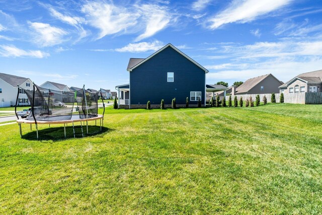 3012 Manchester Dr, Spring Hill, TN 37174 - view of yard featuring a residential view, fence, and a trampoline