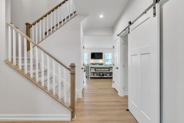3012 Manchester Dr, Spring Hill, TN 37174 - interior space with stairs, recessed lighting, a barn door, and light wood-type flooring