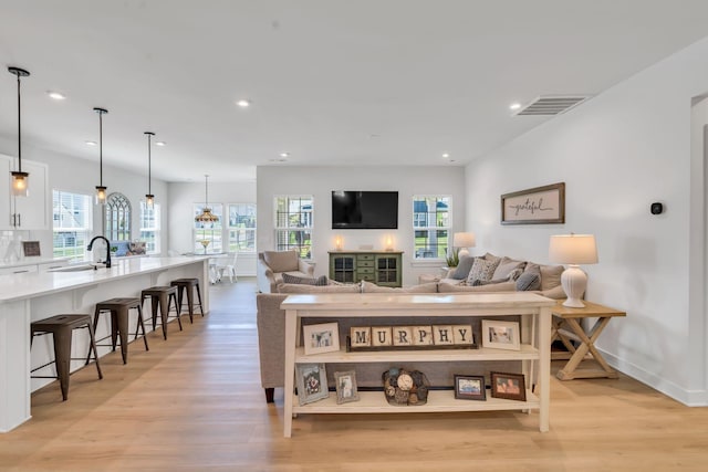 3012 Manchester Dr, Spring Hill, TN 37174 - living area featuring recessed lighting, baseboards, visible vents, and light wood finished floors