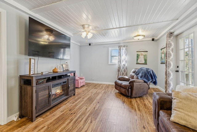 635 Cane Creek Rd, Hohenwald, TN 38462 - living room featuring light wood-style floors, a wealth of natural light, and wooden ceiling