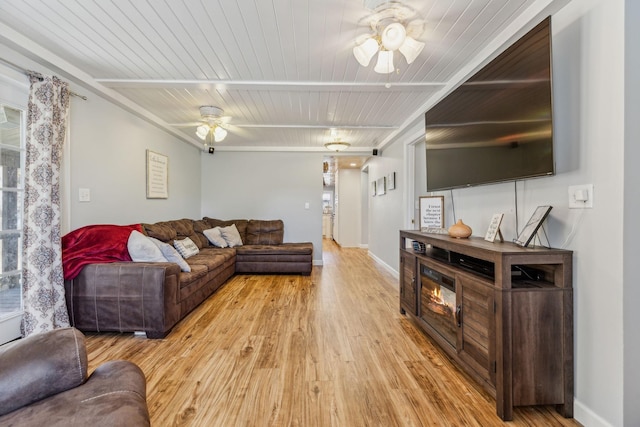 635 Cane Creek Rd, Hohenwald, TN 38462 - living area featuring light wood-style floors, wood ceiling, ceiling fan, and baseboards