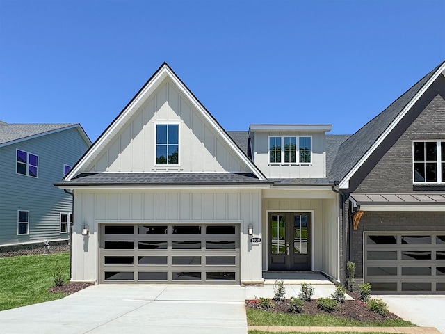 3039 Wiltshire Park Pl, Hermitage, TN 37076 - view of front of home with driveway, board and batten siding, and roof with shingles
