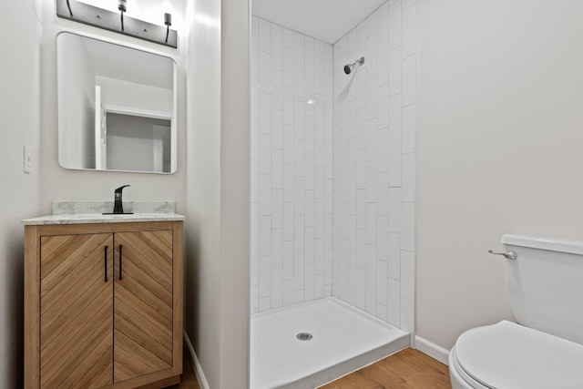1903 S Orchard Knob Ave, Chattanooga, TN 37404 - bathroom featuring toilet, baseboards, a shower stall, and vanity