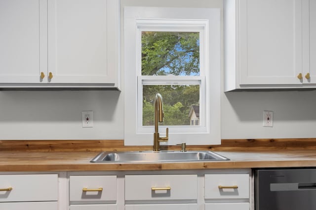 1903 S Orchard Knob Ave, Chattanooga, TN 37404 - kitchen with white cabinetry, wood counters, a sink, and dishwashing machine