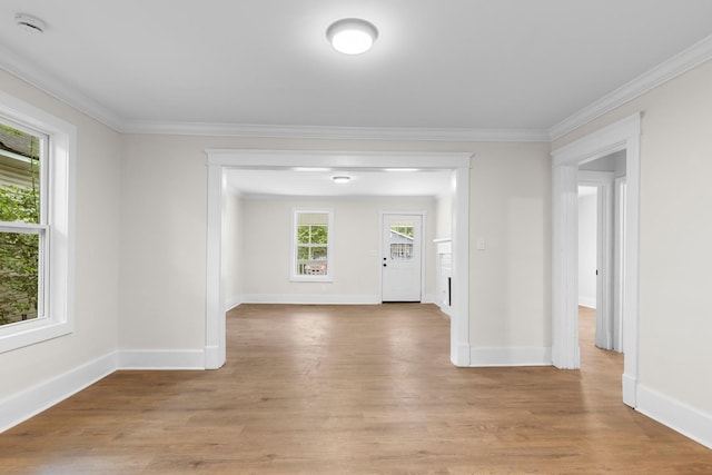1903 S Orchard Knob Ave, Chattanooga, TN 37404 - unfurnished room with crown molding, baseboards, and light wood-style flooring