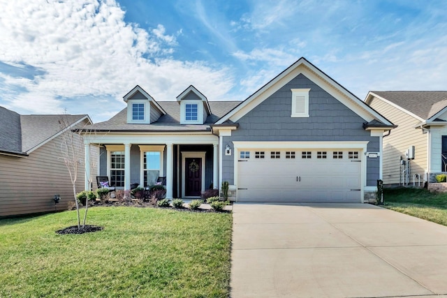 craftsman-style home featuring an attached garage, concrete driveway, a porch, and a front yard