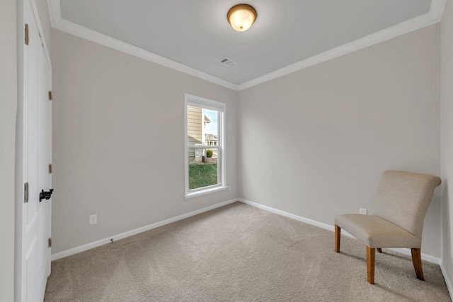 unfurnished room featuring baseboards, ornamental molding, and carpet floors