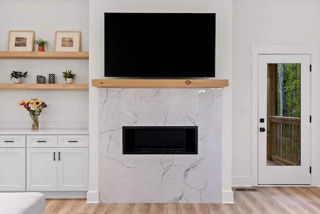 room details with visible vents and wood finished floors