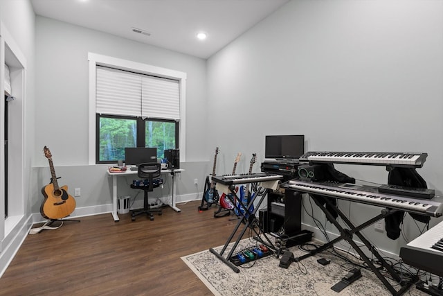 home office featuring visible vents, recessed lighting, baseboards, and wood finished floors