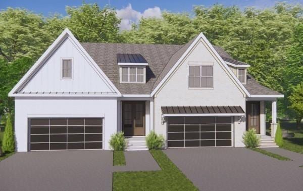 modern inspired farmhouse with a standing seam roof, an attached garage, driveway, and stucco siding