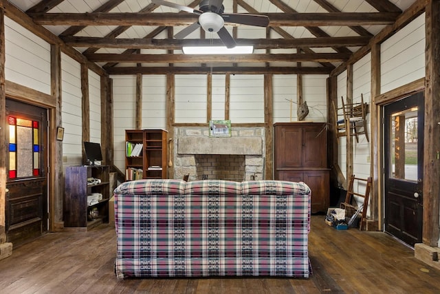 sunroom / solarium featuring beam ceiling