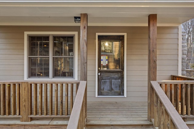 entrance to property with a porch